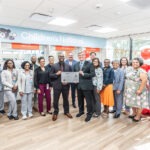 President and CEO, Shawn Griffin, MD presents Children's National Hospital with their Specialty Pharmacy Accreditation Certificate