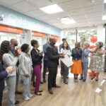 President and CEO, Shawn Griffin, MD presents Children's National Hospital with their Specialty Pharmacy Accreditation Certificate